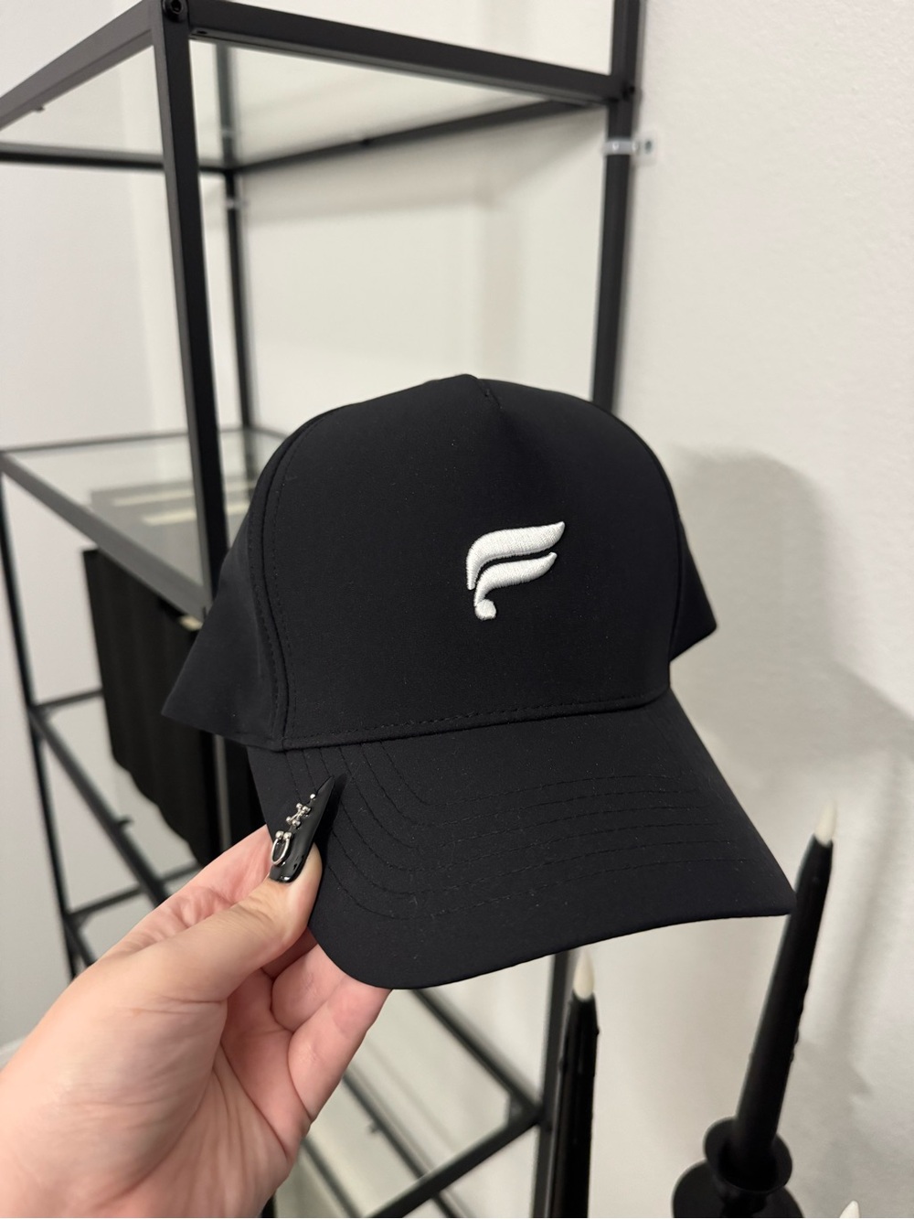 Fabletics Black Cap with White Wing Logo